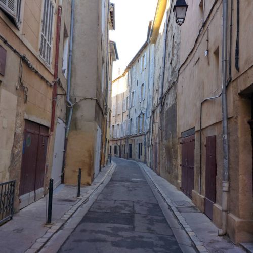 The quiet Rue Venel leading to Place des Cardeurs