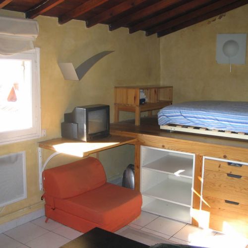 Queen size bed in charming setting