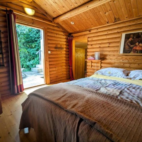 Cozy bedroom with double bed, heater, TV