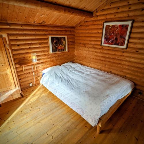 Cozy bedroom with double bed, heater, TV